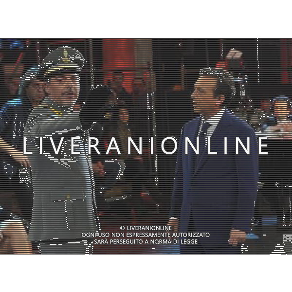 COLOGNO M.se (MI) 25/2/2012 STUDI MEDIASET TRASMISSIONE TELEVISIVA: -CHIAMBRETTI SUNDAY NIGHT SHOW- NELLA FOTO PIERO CHIAMBRETTI NELLA SCENA DELLA GUARDIA DI FINANZA NEGLI STUDI DI REGISTRAZIONE PER ARRESTARE LE TRE ATTIVISTE DEL GRUPPO FEMEN FOTO ROMANO/AG ALDO LIVERANI 
