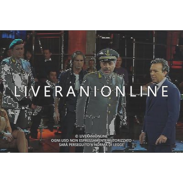 COLOGNO M.se (MI) 25/2/2012 STUDI MEDIASET TRASMISSIONE TELEVISIVA: -CHIAMBRETTI SUNDAY NIGHT SHOW- NELLA FOTO PIERO CHIAMBRETTI NELLA SCENA DELLA GUARDIA DI FINANZA NEGLI STUDI DI REGISTRAZIONE PER ARRESTARE LE TRE ATTIVISTE DEL GRUPPO FEMEN FOTO ROMANO/AG ALDO LIVERANI 