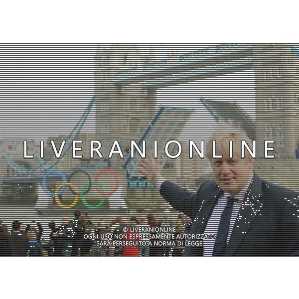 Mayor Boris Johnson watches the 11ft Olympic Rings go down the Thames and under Tower Bridge by City Hall today 28th February 2012 to let the general public know that there is only 150 days left until the Olympic Games begin in London, picture by Marc Larkin/ /PHOTOSHOT/AG ALDO LIVERANI SAS - ITALY ONLY -