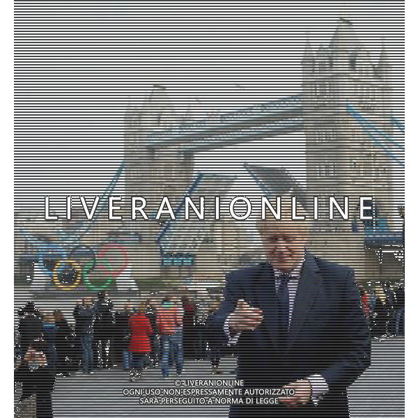 Mayor Boris Johnson watches the 11ft Olympic Rings go down the Thames and under Tower Bridge by City Hall today 28th February 2012 to let the general public know that there is only 150 days left until the Olympic Games begin in London, picture by Marc Larkin/ /PHOTOSHOT/AG ALDO LIVERANI SAS - ITALY ONLY -