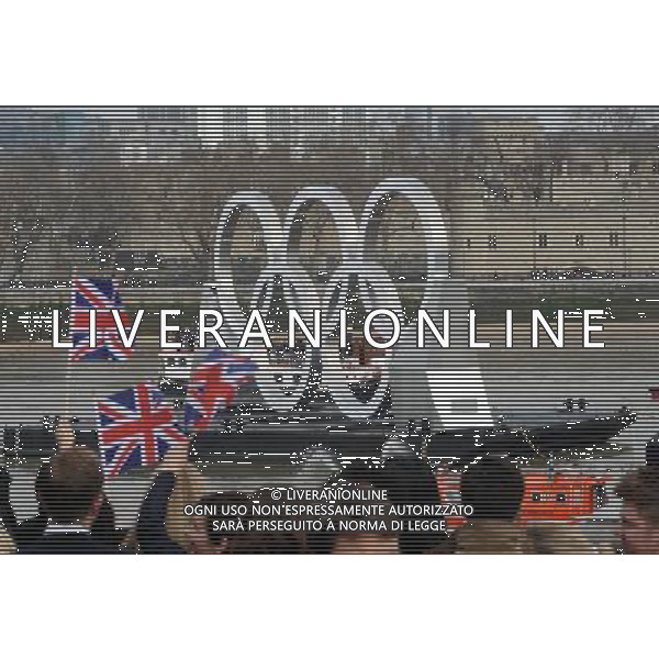 Mayor Boris Johnson watches the 11ft Olympic Rings go down the Thames and under Tower Bridge by City Hall today 28th February 2012 to let the general public know that there is only 150 days left until the Olympic Games begin in London, picture by Marc Larkin/ /PHOTOSHOT/AG ALDO LIVERANI SAS - ITALY ONLY -