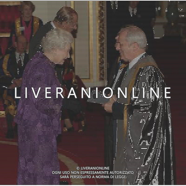 Queen Elizabeth II and The Duke of Edinburgh present a Royal Anniversary Prize for Higher and Further Education to Professor Malcolm Grant CBE and Professor Phil Luthert (obscured) of University College London, at Buckingham Palace, central London. The honour recognises and celebrates outstanding work which is making a practical impact for human progress. ©photoshot/AGENZIA ALDO LIVERANI SAS - ITALY ONLY - REALI INGLESI: La regina Elisabetta II d\'inghilterra, durante il ricevimento della consegna dei premi dei Royal Anniversary Prizes a Buckingham Palace, a Londra.