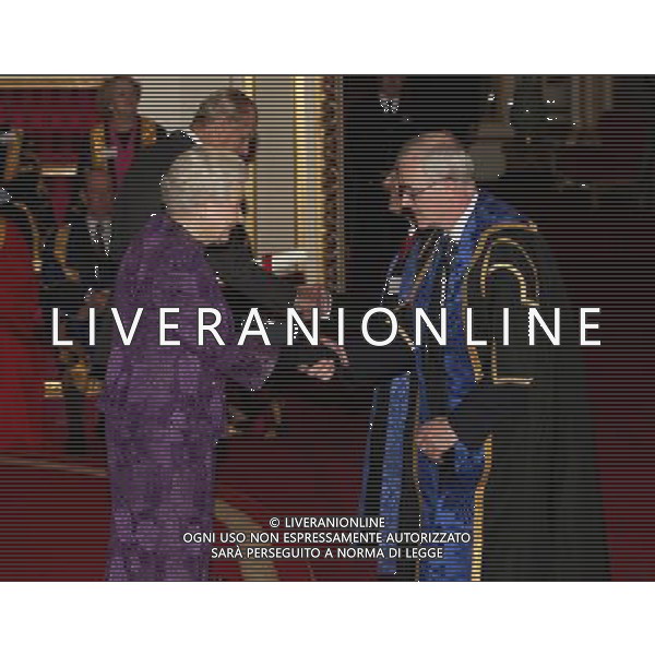 Queen Elizabeth II and The Duke of Edinburgh present a Royal Anniversary Prize for Higher and Further Education to Professor Sir Christopher Snowden and Professor Barry Lloyd (obscured) of the University of Surrey, at Buckingham Palace, central London. The honour recognises and celebrates outstanding work which is making a practical impact for human progress. ©photoshot/AGENZIA ALDO LIVERANI SAS - ITALY ONLY - REALI INGLESI: La regina Elisabetta II d\'inghilterra, durante il ricevimento della consegna dei premi dei Royal Anniversary Prizes a Buckingham Palace, a Londra.