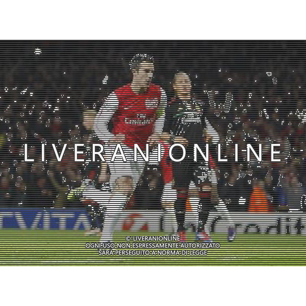 Arsenal\'s Robin van Persie celebrates scoring his sides third goal 3-0 from a penalty kick Football - UEFA Champions League Group F - Arsenal v AC Milan - Tue 06 Mar 2012 - Emirates Stadium - London © CameraSport - 43 Linden Ave. Countesthorpe. Leicester. England. LE8 5PG - Tel: +44 (0) 116 277 4147 - admin@camerasport.com - www.camerasport.com AG ALDO LIVERANI S A S ONLY ITALY