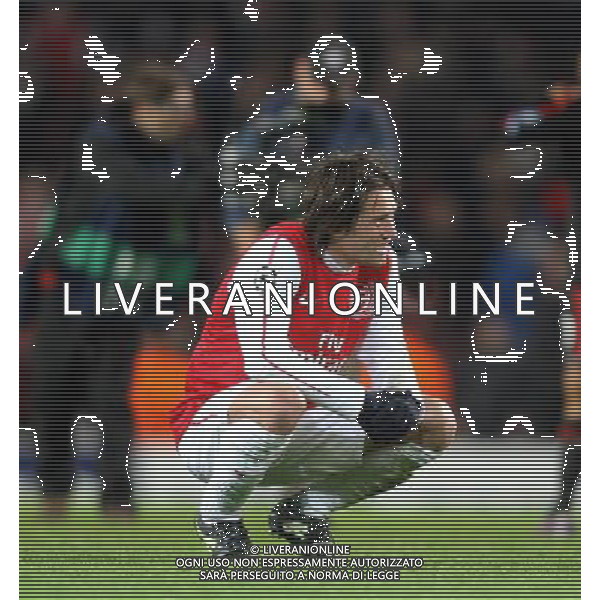 Arsenal\'s Tomas Rosicky shows his dejection at the end of the match losing 3-4 to AC Milan Football - UEFA Champions League Group F - Arsenal v AC Milan - Tue 06 Mar 2012 - Emirates Stadium - London © CameraSport - 43 Linden Ave. Countesthorpe. Leicester. England. LE8 5PG - Tel: +44 (0) 116 277 4147 - admin@camerasport.com - www.camerasport.com AG ALDO LIVERANI S A S ONLY ITALY