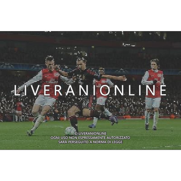 UEFA Champions League 2011/2012 Ottavi di Finale Ritorno Londra - 06.03.2012 Arsenal-Milan Nella Foto:Ibrahimovic Zlatan-Koscielny Laurent /Ph.Vitez-Ag. Aldo Liverani
