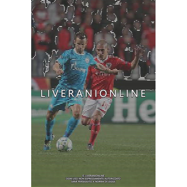 20120306: LISBON, PORTUGAL - Champions League 2011/2012 - 2st leg: SL Benfica vs Zenit FC. In picture: Zenit\'s midfielder Sergey Semak tries to escape Benfica\'s defense Maxi Pereira. PHOTO: Carlos Rodrigues/CITYFILES pilka nozna liga mistrzow sezon 2011/2012 BENFICA LIZBONA vs ZENIT SANKT PETERSBURG FOT. CITYFILES/NEWSPIX.PL PORTUGAL,BRAZIL,SPAIN,GERMANY,FRANCE,UK OUT !!! --- Newspix.pl /AG ALDO LIVERANI SAS ITALY ONLY *** Local Caption *** .