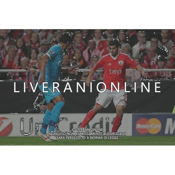 20120306: LISBON, PORTUGAL - Champions League 2011/2012 - 2st leg: SL Benfica vs Zenit FC. In picture: Benfica\'s forward Nolito tries to pass trough Zenit\'s defender Bruno Alves. PHOTO: Carlos Rodrigues/CITYFILES pilka nozna liga mistrzow sezon 2011/2012 BENFICA LIZBONA vs ZENIT SANKT PETERSBURG FOT. CITYFILES/NEWSPIX.PL PORTUGAL,BRAZIL,SPAIN,GERMANY,FRANCE,UK OUT !!! --- Newspix.pl /AG ALDO LIVERANI SAS ITALY ONLY *** Local Caption *** .