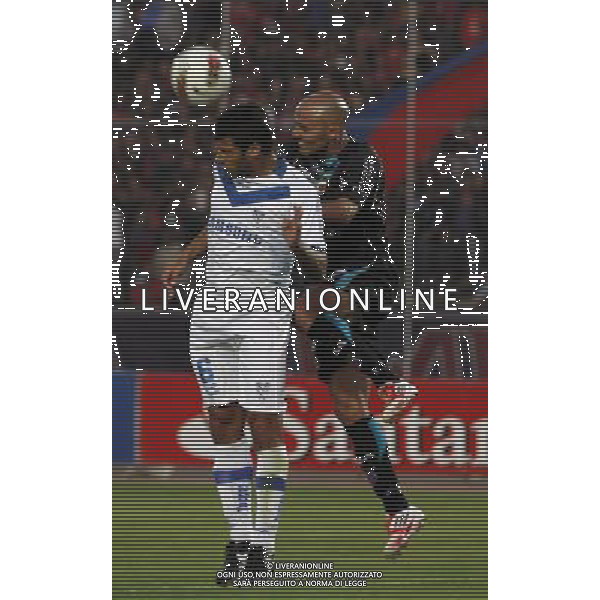 (120308) -- QUITO, March 8, 2012 () -- Maximiliano Bevaqua (R) of Deportivo Quito of Ecuador vies the ball with Sebastian Dominguez of Velez Sarsfield of Argentina during a Copa Libertadores match at the Olimpico Atahualpa stadium, in Quito, capital of Ecuador, on March 7, 2012. (/Santiago Armas) (sa) (py) ©photoshot/AGENZIA ALDO LIVERANI SAS - ITALY ONLY - Quito dell\'Ecuador - Velez Sarsfield dell\'Argentina durante una partita di Copa Libertadores alla stadio Olimpico Atahualpa, in Quito, capitale dell\'Ecuador, il 7 marzo 2012. 