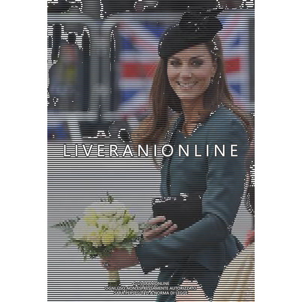 LEICESTER, ENGLAND - MARCH 08: Catherine, Duchess of Cambridge smiles as she arrives in Leicester city centre on March 8, 2012 in Leicester, England. The royal visit to Leicester marks the first date of Queen Elizabeth II\'s Diamond Jubilee tour of the UK between March 8 and July 25, 2012. ©photoshot/AGENZIA ALDO LIVERANI SAS - ITALY ONLY - REALI INGLESI: La Regina Elisabetta II d\'inghilterra accompagnata dal Duca di Edimburgo e da Kate Middleton Duchessa di Cambridge in visita a Leicester, 8 marzo 2012.