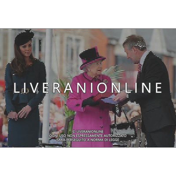 Queen Elizabeth II is presented a book by Leicester City mayor Sir Peter Soulby at Leicester\'s Clock Tower during a visit to the city as part of the Diamond Jubilee Tour. ©photoshot/AGENZIA ALDO LIVERANI SAS - ITALY ONLY - REALI INGLESI: La Regina Elisabetta II d\'inghilterra accompagnata dal Duca di Edimburgo e da Kate Middleton Duchessa di Cambridge in visita a Leicester, 8 marzo 2012.
