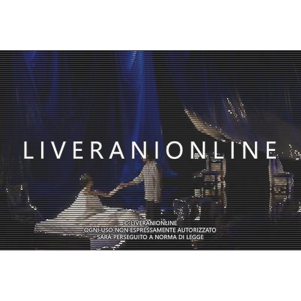 (120309) -- BEIJING, March 9, 2012 () -- Actor Liu Chang (R) plays Ma Lu, a rhinoceros feeder who is in love with Ming Ming, played by actress Huang Xiangli (L), during the latest production of \'Rhinoceros In Love\', an experimental play directed by Meng Jinghui, at Beehive Theater in Beijing, capital of China, March 8, 2012. \'Rhinoceros In Love\' tells the story of a rhinoceros feeder who falls in love with a beautiful woman. About 900 performances of the play have been staged in 36 cities worldwide since its debut in summer 1999. (/Jin Liangkuai) (lmm) ©photoshot/AGENZIA ALDO LIVERANI SAS - ITALY ONLY - Attori e attrici teatrali eseguire durante l\'ultima produzione di \'rinoceronte in amore\', un rappresentazione sperimentale diretto da Meng Jinghui, al Teatro Beehive a Pechino, capitale della Cina, 8 marzo 2012.