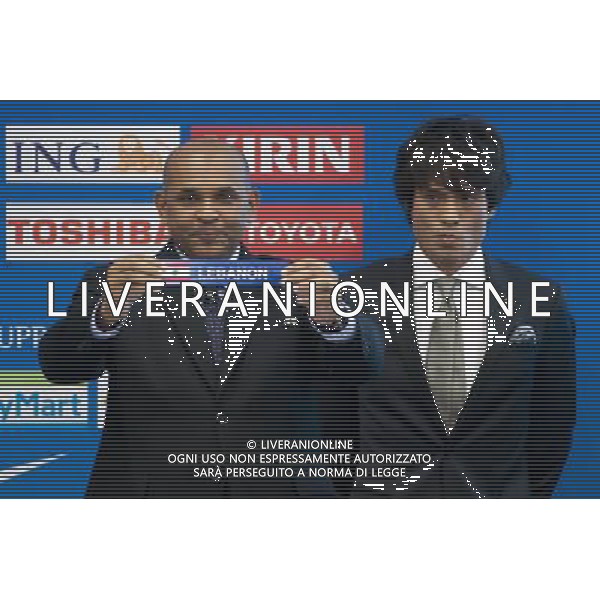 (120309) -- KUALA LUMPUR, March 9, 2012 () -- The Asian Football Confederation (AFC) executive director Windsor John (L), flanked by Japan\'s former football star Tsuneyasu Miyamoto displays Lebanon\'s draw during 2014 FIFA World Cup Brazil Asian qualifiers ceremony at the AFC headquarters in Bukit Jalil outside Kuala Lumpur, Malaysia, March 9, 2012. (/Chong Voon Chung) ©photoshot/Agenzia Aldo Liverani Sas - ITALY ONLY - Il direttore esecutivo Windsor John dell\'Asian Football Confederation (AFC) con l\'ex calciatore Giapponese Tsuneyasu Miyamoto durante la cerimonia per i sorteggi delle qualificazioni per FIFA World Cup Brazil 2014 a Bukit Jalil fuori Kuala Lumpur, Malaysia, 9 marzo 2012.