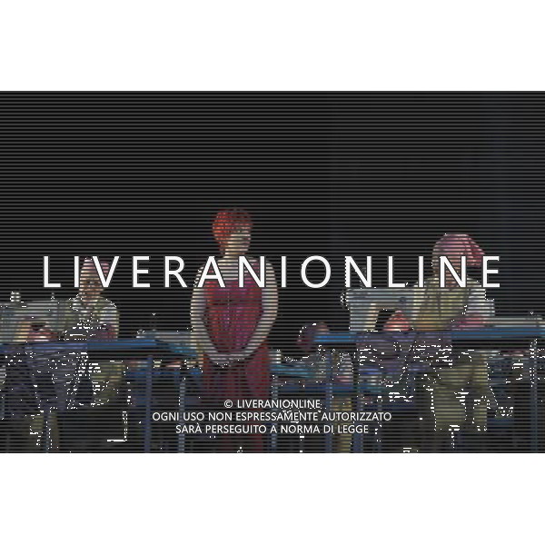 The UK premiere of a new opera Miss Fortune by leading British opera composer Judith Weir transposes the Sicilian folktale Misfortune to today as the daughter of a rich family turns her back on wealth to make her own way in the world. Royal Opera House, Covent Garden, London. : Emma Bell has Tina (Miss Fortune) with cast members of the opera Miss Fortune ©PHOTOSHOT/Agenzia Aldo Liverani Sas - ITALY ONLY - EDITORIAL USE ONLY ©photoshot/Agenzia Aldo Liverani Sas - ITALY ONLY - La prima nel Regno Unito di una nuova opera teatrale di Miss Fortune del compositore d\'opera britannica Judith Weir al Royal Opera House, Covent Garden, Londra