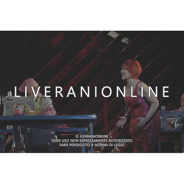 The UK premiere of a new opera Miss Fortune by leading British opera composer Judith Weir transposes the Sicilian folktale Misfortune to today as the daughter of a rich family turns her back on wealth to make her own way in the world. Royal Opera House, Covent Garden, London. : Emma Bell has Tina (Miss Fortune) with cast members of the opera Miss Fortune ©PHOTOSHOT/Agenzia Aldo Liverani Sas - ITALY ONLY - EDITORIAL USE ONLY ©photoshot/Agenzia Aldo Liverani Sas - ITALY ONLY - La prima nel Regno Unito di una nuova opera teatrale di Miss Fortune del compositore d\'opera britannica Judith Weir al Royal Opera House, Covent Garden, Londra