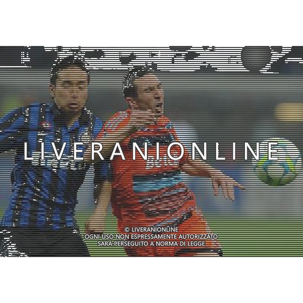 UEFA Champions League 2011/2012 Ottavi di Finale Ritorno Milano - 13.03.2012 Inter-Olympique Marsiglia Nella Foto:Nagatomo Yuto-Amalfitano Morgan /Ph.Vitez-Ag. Aldo Liverani