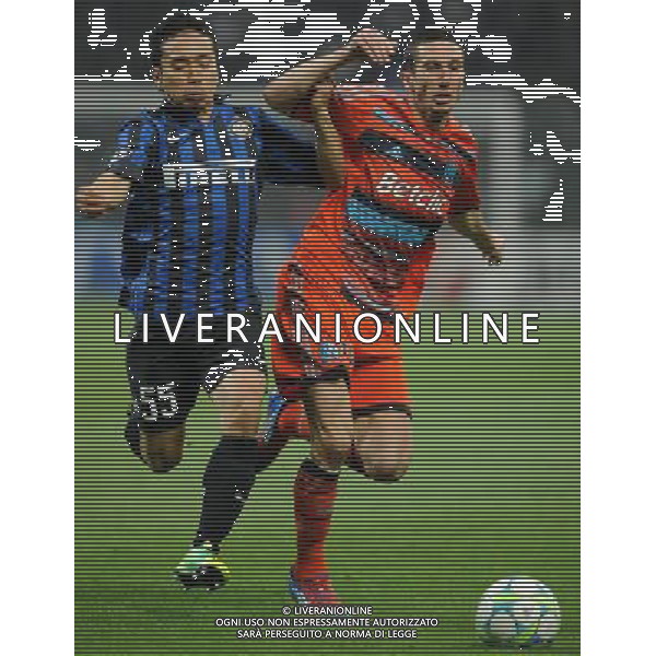 UEFA Champions League 2011/2012 Ottavi di Finale Ritorno Milano - 13.03.2012 Inter-Olympique Marsiglia Nella Foto:Nagatomo Yuto-Amalfitano Morgan /Ph.Vitez-Ag. Aldo Liverani