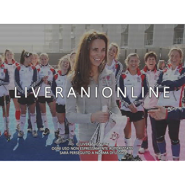 LONDON, ENGLAND - MARCH 15: Catherine, Duchess of Cambridge smiles as she meets the GB HockeyTeam at the Riverside Arena in the Olympic Park on March 15, 2012 in London, England. The Duchess of Cambridge viewed the Olympic park as well as meeting members of the men\'s and women\'s GB Hockey teams. ©photoshot/AGENZIA ALDO LIVERANI SAS - ITALY ONLY - REALI INGLESI: Kate Middleton, duchessa di Cambridge in visita al Parco Olimpico presso l\'Arena Riverside per incontrare i membri degli uomini e donne della squadra di hockey inglese - Londra, Inghilterra - 15 marzo 2012