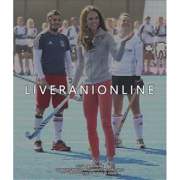 LONDON, ENGLAND - MARCH 15: Catherine, Duchess of Cambridge plays hockey with the GB hockey teams at the Riverside Arena in the Olympic Park on March 15, 2012 in London, England. The Duchess of Cambridge viewed the Olympic park as well as meeting members of the men\'s and women\'s GB Hockey teams. ©photoshot/AGENZIA ALDO LIVERANI SAS - ITALY ONLY - REALI INGLESI: Kate Middleton, duchessa di Cambridge in visita al Parco Olimpico presso l\'Arena Riverside per incontrare i membri degli uomini e donne della squadra di hockey inglese - Londra, Inghilterra - 15 marzo 2012