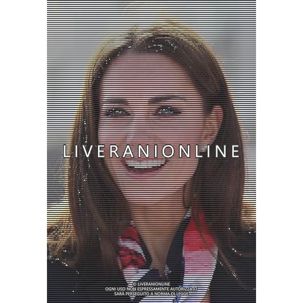 LONDON, ENGLAND - MARCH 15: Catherine, Duchess of Cambridge smiles as she wears the Team GB Official Supporter\'s Scarf for London 2012 before meeting the GB HockeyTeam at the Riverside Arena in the Olympic Park on March 15, 2012 in London, England. The Duchess of Cambridge viewed the Olympic park as well as meeting members of the men\'s and women\'s GB Hockey teams. ©photoshot/AGENZIA ALDO LIVERANI SAS - ITALY ONLY - REALI INGLESI: Kate Middleton, duchessa di Cambridge in visita al Parco Olimpico presso l\'Arena Riverside per incontrare i membri degli uomini e donne della squadra di hockey inglese - Londra, Inghilterra - 15 marzo 2012