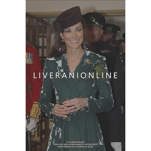 ALDERSHOT, ENGLAND - MARCH 17: Catherine, Duchess of Cambridge holds a glass of Harvey\'s Bristol Creme in the Junior\'s Mess as she visits Aldershot Barracks on St Patrick\'s Day on March 17, 2012 in Aldershot, England. The Duchess presented shamrocks to the Irish Guards at a St Patrick\'s Day parade during her visit. ©photoshot/Agenzia Aldo Liverani Sas - ITALY ONLY - REALI INGLESI: Kate Middleton duchessa di Cambridge con il battaglione delle Guardie irlandesi durante la Parata del giorno di San Patrizio, Caserma Mons, Aldershot 17 Marzo 2012.