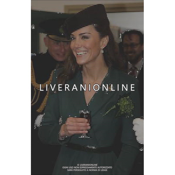 ALDERSHOT, ENGLAND - MARCH 17: Catherine, Duchess of Cambridge holds a glass of Harvey\'s Bristol Creme in the Junior\'s Mess as she visits Aldershot Barracks on St Patrick\'s Day on March 17, 2012 in Aldershot, England. The Duchess presented shamrocks to the Irish Guards at a St Patrick\'s Day parade during her visit. (Photo by Chris Jackson - WPA Pool / Getty Images) ©photoshot/Agenzia Aldo Liverani Sas - ITALY ONLY - REALI INGLESI: Kate Middleton duchessa di Cambridge con il battaglione delle Guardie irlandesi durante la Parata del giorno di San Patrizio, Caserma Mons, Aldershot 17 Marzo 2012.