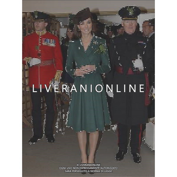 ALDERSHOT, ENGLAND - MARCH 17: Catherine, Duchess of Cambridge holds a glass of Harvey\'s Bristol Creme in the Junior\'s Mess as she visits Aldershot Barracks on St Patrick\'s Day on March 17, 2012 in Aldershot, England. The Duchess presented shamrocks to the Irish Guards at a St Patrick\'s Day parade during her visit. ©photoshot/Agenzia Aldo Liverani Sas - ITALY ONLY - REALI INGLESI: Kate Middleton duchessa di Cambridge con il battaglione delle Guardie irlandesi durante la Parata del giorno di San Patrizio, Caserma Mons, Aldershot 17 Marzo 2012.