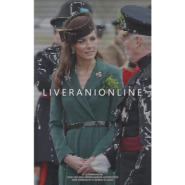 ALDERSHOT, ENGLAND - MARCH 17: Catherine, Duchess of Cambridge takes part in a St Patrick\'s Day parade as she visits Aldershot Barracks on St Patrick\'s Day on March 17, 2012 in Aldershot, England. The Duchess presented shamrocks to the Irish Guards at a St Patrick\'s Day parade during her visit. ©photoshot/Agenzia Aldo Liverani Sas - ITALY ONLY - REALI INGLESI: Kate Middleton duchessa di Cambridge con il battaglione delle Guardie irlandesi durante la Parata del giorno di San Patrizio, Caserma Mons, Aldershot 17 Marzo 2012.