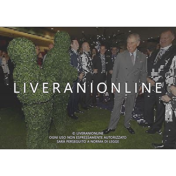 Britain\'s Prince Charles, right, is introduced to people dressed as living topiary statues during his visit at the Ideal Home Show, in London, Friday, March 16, 2012. The Prince, who visited the show last year, formally opened the 17 day show, which is now in its 104th year and attracts over 270,000 visitors. ©photoshot/Agenzia Aldo Liverani Sas - ITALY ONLY - REALI INGLESI: Il principe Carlo d\'inghilterra durante la sua visita alla Mostra della Casa ideale, a Londra, Venerd“, 16 Marzo 2012.