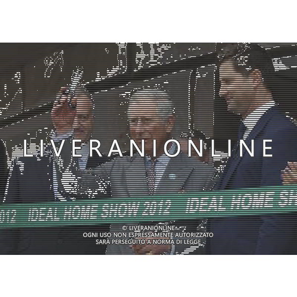 Britain\'s Prince Charles, center, gets ready to officially open the Ideal Home Show, in London, Friday, March 16, 2012. The Prince, who visited the show last year, formally opened the 17 day show, which is now in its 104th year and attracts over 270,000 visitors. ©photoshot/Agenzia Aldo Liverani Sas - ITALY ONLY - REALI INGLESI: Il principe Carlo d\'inghilterra durante la sua visita alla Mostra della Casa ideale, a Londra, Venerd“, 16 Marzo 2012.