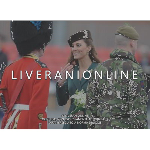 The Duchess of Cambridge sports a Shamrock during a visit to Mons barracks in Aldershot, where she presented the Irish Guards with their annual Shamrock. 17/3/12 by Paul Vicente/Sunday Times/NPA ROYAL ROTA. ©photoshot/Agenzia Aldo Liverani Sas - ITALY ONLY - REALI INGLESI: Kate Middleton duchessa di Cambridge con il battaglione delle Guardie irlandesi durante la Parata del giorno di San Patrizio, Caserma Mons, Aldershot 17 Marzo 2012.