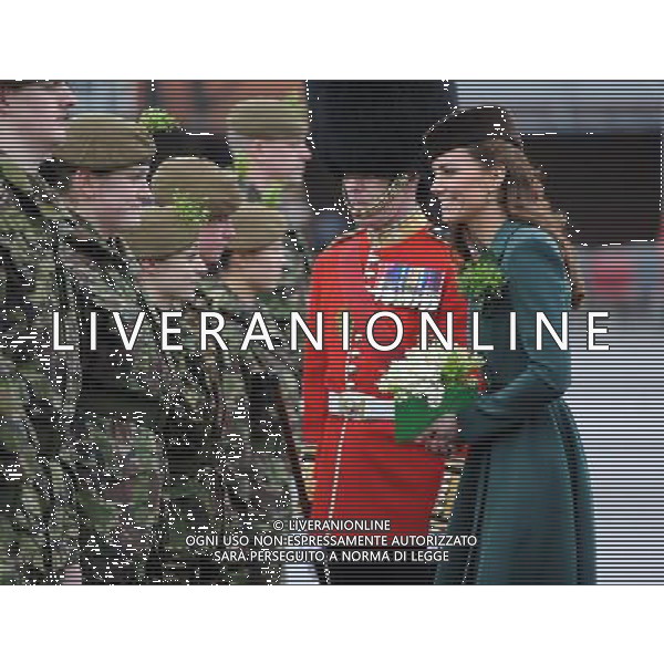 The Duchess of Cambridge meets members of the Irish Guards Cadets during St Patrick\'s Day at Mons Barracks. The Duchess of Cambridge presented shamrocks to the 1st Battalion Irish Guards at the St PatrickÍs Day Parade, Mons Barracks, Aldershot. The origin of the Royal gift of Shamrock dates back to the Regiment\'s first St Patrick\'s day in 1901. The Duchess also met the Irish Guards mascot, an Irish Wolfhound called Conmael and presented him with a Shamrock. ©PHOTOSHOT/ag. Aldo Liverani sas - ITALY ONLY -