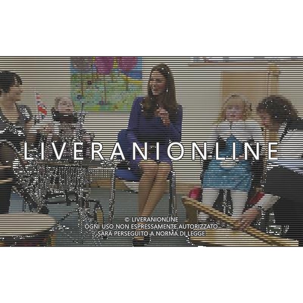 Britain\'s Duchess of Cambridge joins in a music class during a visit to The Treehouse in Ipswich, England, Monday, March 19, 2012. The Duchess of Cambridge visited to formally open The Treehouse, a children\'s hospice service for Suffolk and Essex. ©PHOTOSHOT/ag. Aldo Liverani sas - ITALY ONLY -