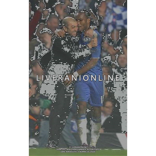 Chelsea coach Roberto Di Matteo celebrates after the match with Chelsea\'s Didier Drogba Football - UEFA Champions League Group E - Chelsea v Napoli - Wed 14 March 2012 - Stamford Bridge - London © CameraSport - 43 Linden Ave. Countesthorpe. Leicester. England. LE8 5PG - Tel: +44 (0) 116 277 4147 - admin@camerasport.com - www.camerasport.com AG ALDO LIVERANI S A S ONLY ITALY