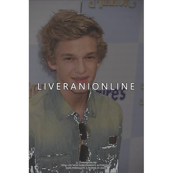 HOLLYWOOD, CA - MARCH 17: Cody Simpson arrives at the \'Mirror Mirror\' Los Angeles Premiere at Grauman\'s Chinese Theatre on March 17, 2012 in Hollywood, California. /photoshot/ag aldo liverani/italy only
