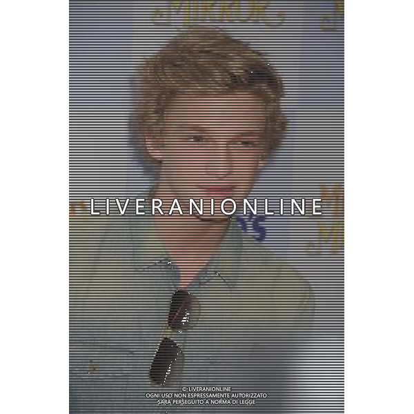 HOLLYWOOD, CA - MARCH 17: Cody Simpson arrives at the \'Mirror Mirror\' Los Angeles Premiere at Grauman\'s Chinese Theatre on March 17, 2012 in Hollywood, California. /photoshot/ag aldo liverani/italy only