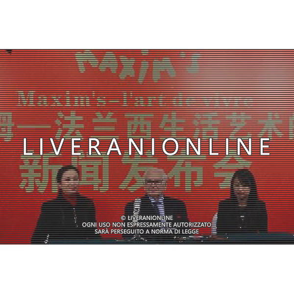 (120327) -- HEFEI, March 27, 2012 () -- Renowned fashion designer Pierre Cardin (C) attends a press conference in Hefei, capital of east China\'s Anhui Province, March 27, 2012. A press conference in the name of \'Maxim\'s-l\'art de vivre\' was held here on Tuesday, the 90-year-old designer Pierre Cardin introduced his design concepts and inspirations on both Pierre Cardin fashions and Maxim\'s restaurants. The popular Maxim\'s opened its 11th branch restaurant in the world here on Tuesday. The restaurant and the Maxim\'s brand belongs to Pierre Cardin. (/Xu Zijian) AG ALDO LIVERANI S A S ONLY ITALY