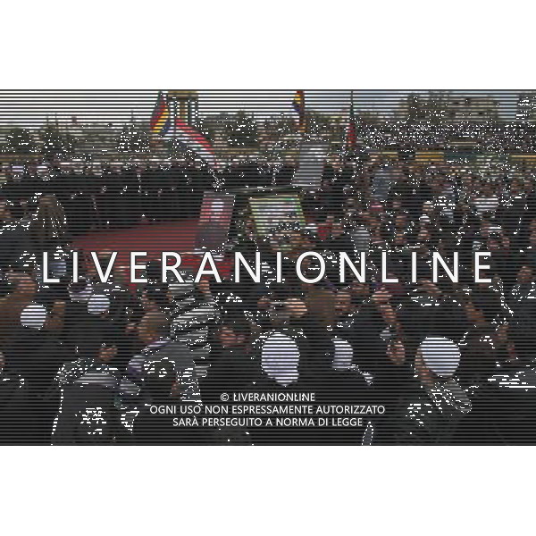 (120327) -- DAMASCUS, March 27, 2012 () -- Crowd of mourners attend the funeral procession of late Druze Sheikh Ahmad Salman al-Hajari, the highest spiritual leader of the 700,000-strong Druze community in Syria, at al-Baladi stadium in Swiedah province, Syria, March 27, 2012. Al-Hajari died of a car accident on March 25. (/Hazim) /photoshot/AG ALDO LIVERANI SAS ITALY ONLY