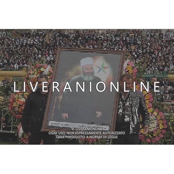 (120327) -- DAMASCUS, March 27, 2012 () -- Crowd of mourners attend the funeral procession of late Druze Sheikh Ahmad Salman al-Hajari, the highest spiritual leader of the 700,000-strong Druze community in Syria, at al-Baladi stadium in Swiedah province, Syria, March 27, 2012. Al-Hajari died of a car accident on March 25. (/Hazim) /photoshot/AG ALDO LIVERANI SAS ITALY ONLY