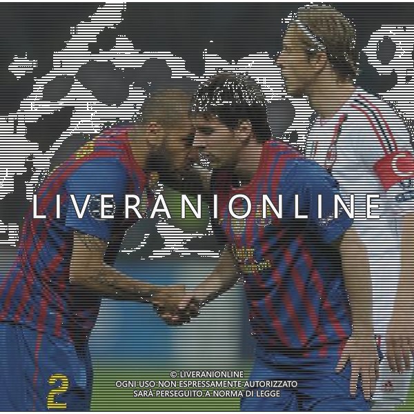 UEFA Champions League 2011/2012 Quarti di Finale Andata Milano - 28.03.2012 Milan-Barcellona Nella Foto:dani alves e lionel messi /Ph.Vitez-Ag. Aldo Liverani