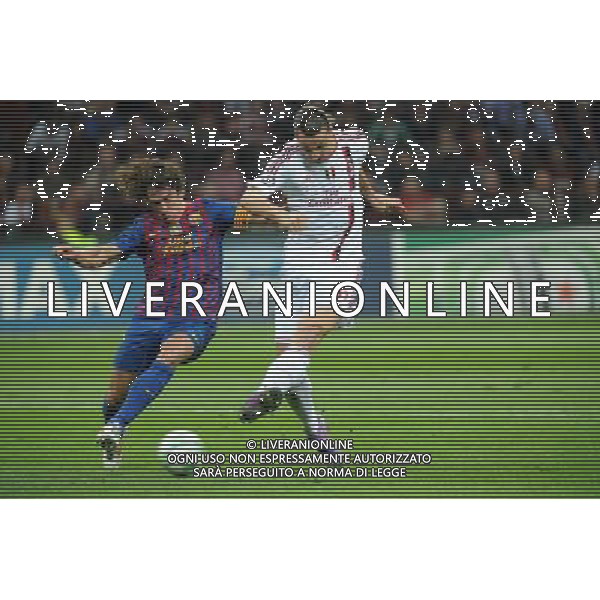 UEFA Champions League - Quarti di finale gara di andata Milano 28-03-2012 Milan - Barcellona nella foto: puyol e zlatan Ibrahimovic fallisce una buona occasione foto Roberto Garavaglia - ag. Aldo Liverani sas