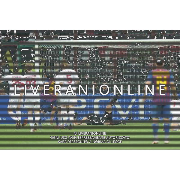 UEFA Champions League - Quarti di finale gara di andata Milano 28-03-2012 Milan - Barcellona nella foto: christian Abbiati para la conclusione ravvicinata di Sanchez foto Roberto Garavaglia - ag. Aldo Liverani sas