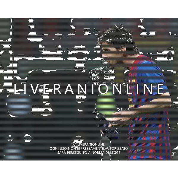 UEFA Champions League 2011/2012 Quarti di Finale Andata Milano - 28.03.2012 Milan-Barcellona Nella Foto:messi lionel si disseta /Ph.Vitez-Ag. Aldo Liverani