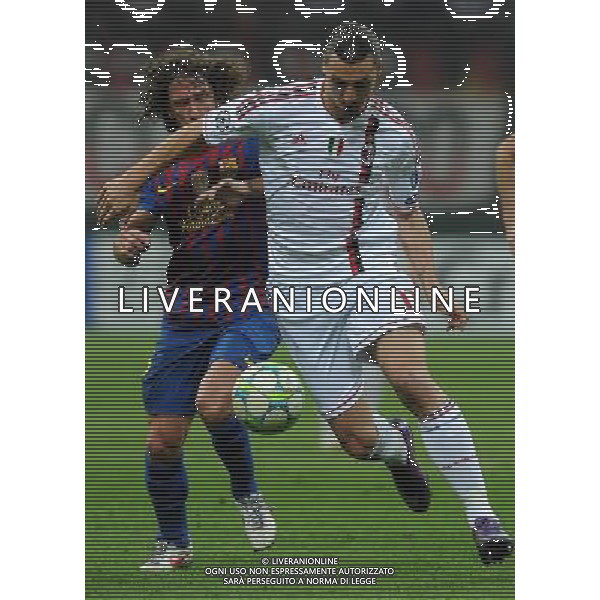UEFA Champions League 2011/2012 Quarti di Finale Andata Milano - 28.03.2012 Milan-Barcellona Nella Foto: zlatan ibrahimovic e puyol /Ph.Vitez-Ag. Aldo Liverani
