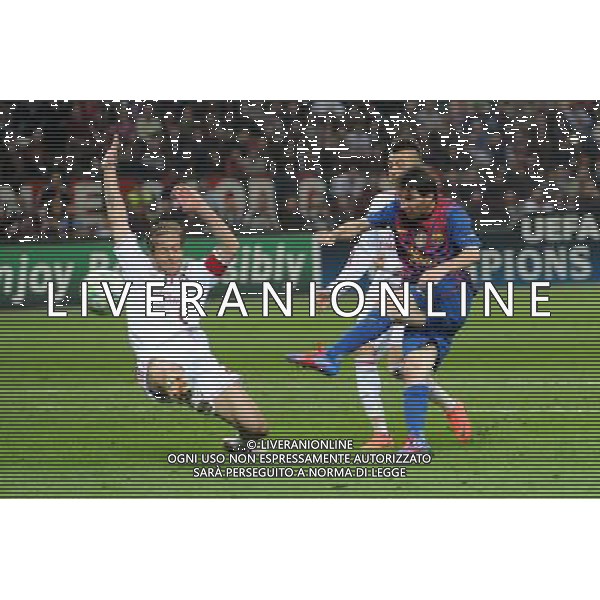 UEFA Champions League - Quarti di finale gara di andata Milano 28-03-2012 Milan - Barcellona nella foto: il salvataggio di Ambrosini sul tiro a colpo sicuro di Messi foto Roberto Garavaglia - ag. Aldo Liverani sas