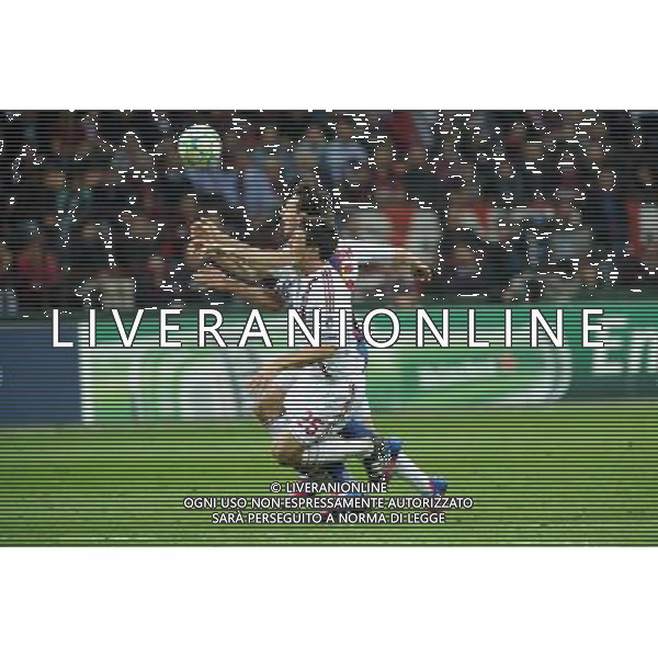 UEFA Champions League - Quarti di finale gara di andata Milano 28-03-2012 Milan - Barcellona nella foto: Messi schiacciato tra Bonera e Mesbah finisce a terra l\'arbitro lascia correre foto Roberto Garavaglia - ag. Aldo Liverani sas