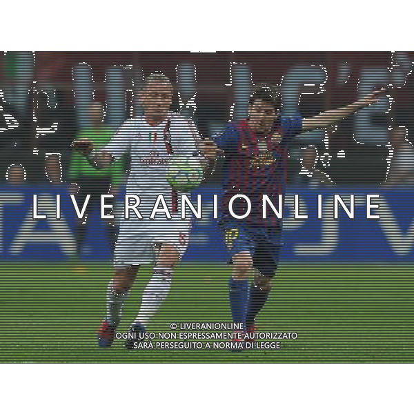 UEFA Champions League 2011/2012 Quarti di Finale Andata Milano - 28.03.2012 Milan-Barcellona Nella Foto:Messi Lionel-Mexes Philippe /Ph.Vitez-Ag. Aldo Liverani