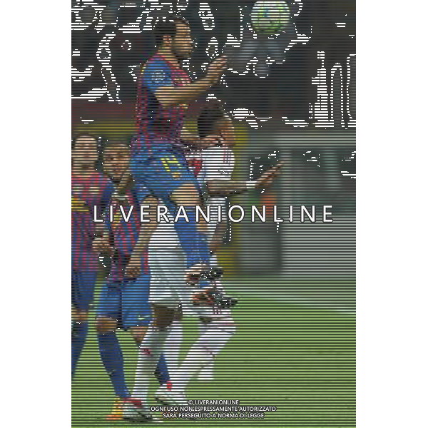 UEFA Champions League - Quarti di finale gara di andata Milano 28-03-2012 Milan - Barcellona nella foto: Javier Mascherano (Barcellona) a SX in contrasto su Kevin Prince Boateng (Milan) foto Roberto Garavaglia - ag. Aldo Liverani sas