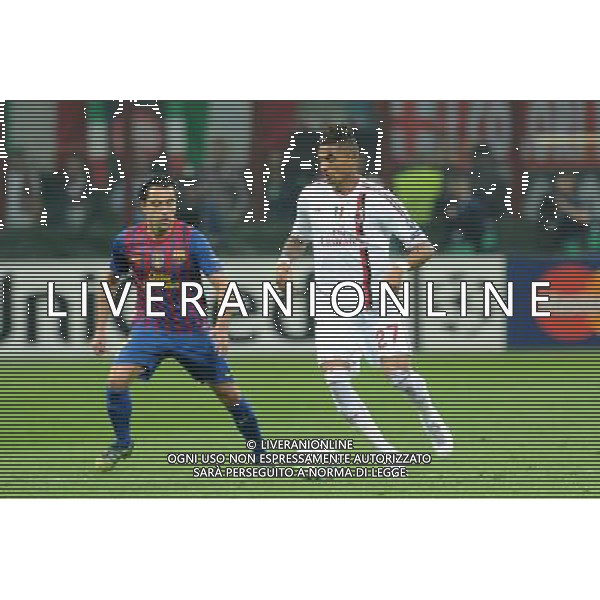 UEFA Champions League - Quarti di finale gara di andata Milano 28-03-2012 Milan - Barcellona nella foto: Kevin Prince Boateng (Milan) e sulla SX Xavi Hernandez (Barcellona) foto Roberto Garavaglia - ag. Aldo Liverani sas