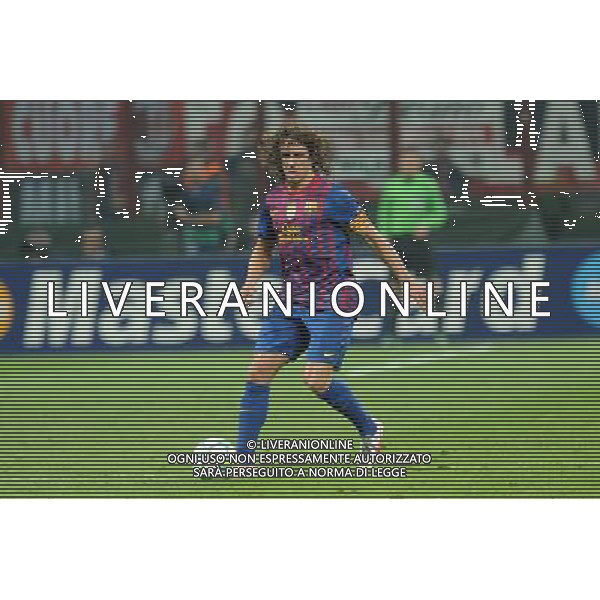 UEFA Champions League - Quarti di finale gara di andata Milano 28-03-2012 Milan - Barcellona nella foto: Carles Puyol (Barcellona) foto Roberto Garavaglia - ag. Aldo Liverani sas
